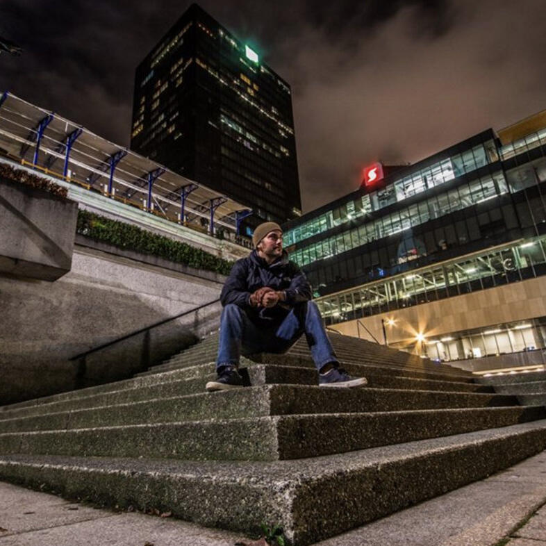 MBPStudios Regular Collaborator B.Hayes sitting on some steps in Vancouver
